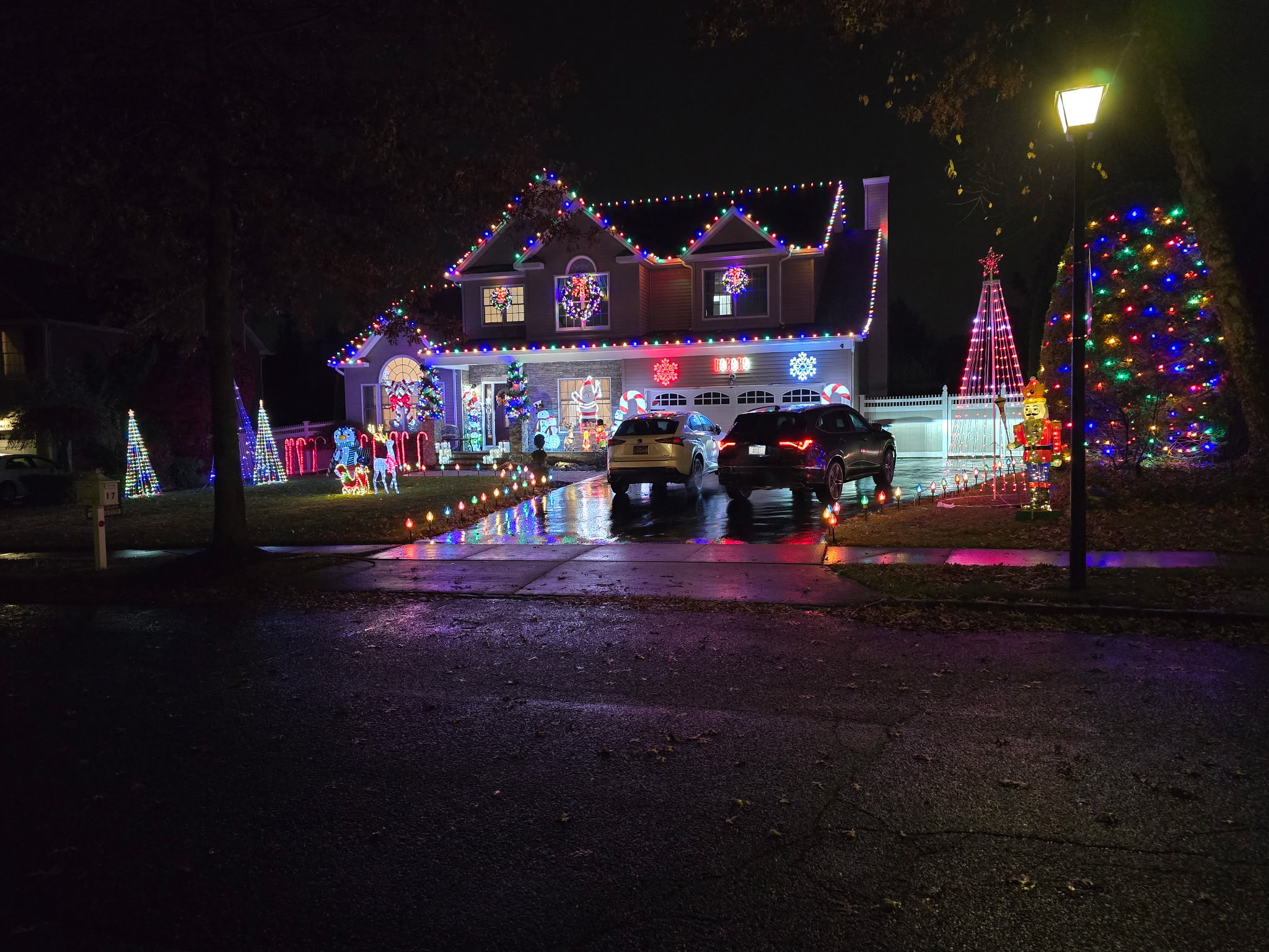 Colorful Christmas lights installed on a residential exterior